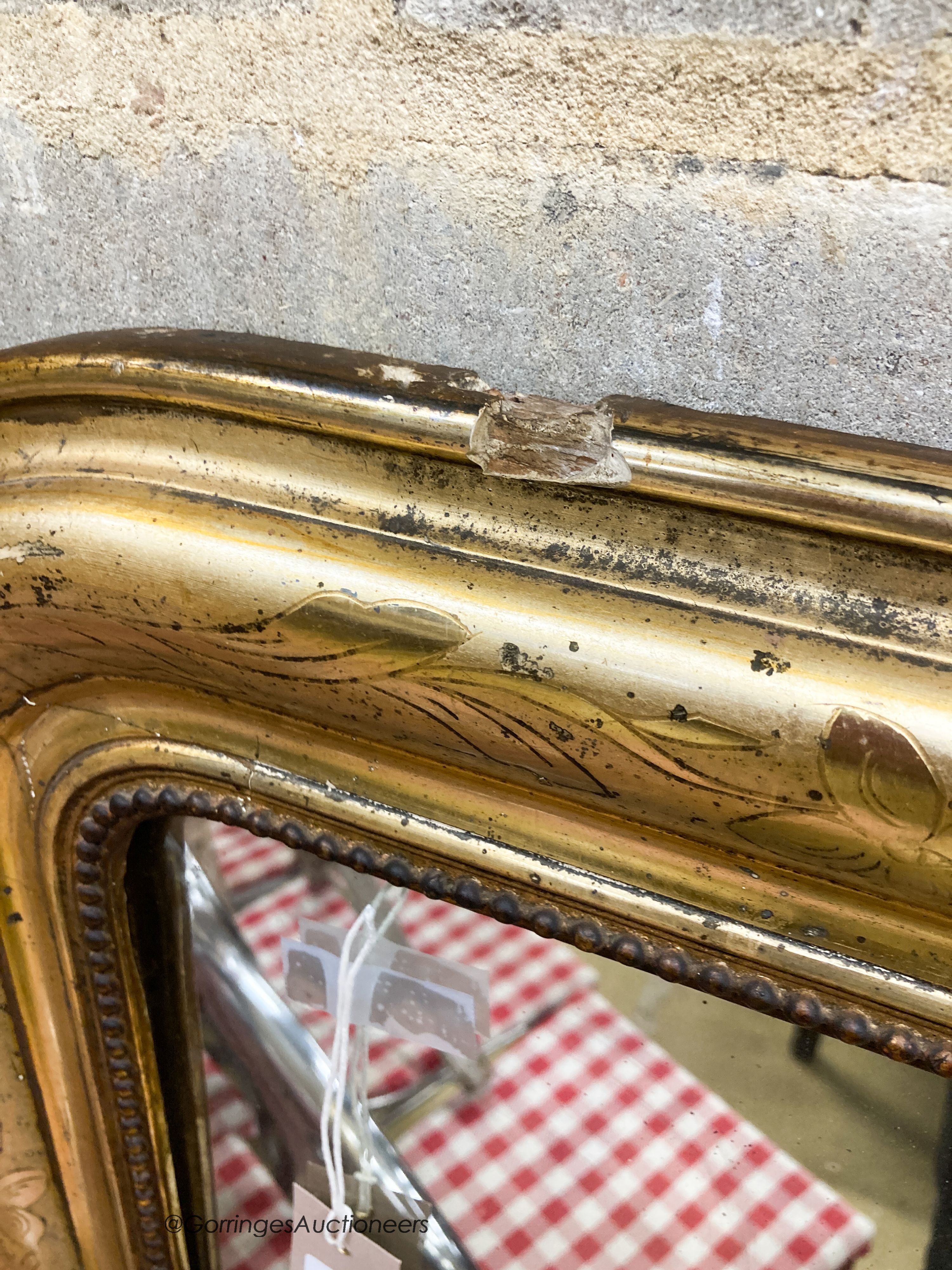 A 19th century French giltwood overmantel mirror, width 90cm, height 132cm